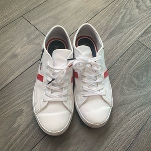 White Lacoste size nine shoes. Worn once.